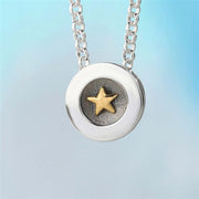 gold-star-pendant-by-alan-ardiff